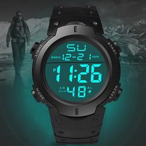 Digital sports watch with large display and green backlight for outdoor adventure use