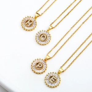 Gold letter pendants H-O-P-E with cubic zirconia inlays on stainless steel chain