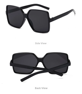 Detail view of large square sunglasses showing side profile and back hinge design