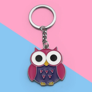 Cartoon owl keychain with colorful enamel dripping oil finish and vibrant wings