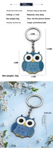 Detailed size specifications and macro view of the blue enamel owl keychain pendant