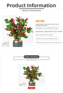 Detailed view of artificial red pomegranate branches with green leaves in a rustic vase