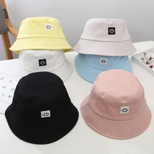 Toddler cotton bucket hats featuring cute smiley face patches in six vibrant summer colors