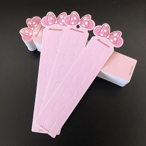 Pink paper hair clip display cards with red bow design for jewelry packaging