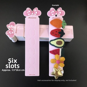 Pink polka dot bow hair accessory display card with 6 slots for hair clip organization