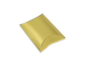 Close-up of golden metallic pillow gift box for jewelry and candy packaging