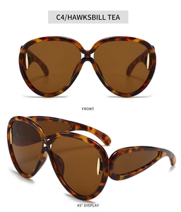 Détails de lunettes aviateur tendance avec monture écaille de tortue et finitions dorées