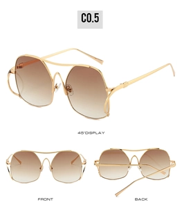 Detailed views of gold metal double bridge cat eye sunglasses with brown gradient lenses