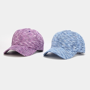 Detail of space dye textured baseball cap in purple and blue moisture-wicking fabric