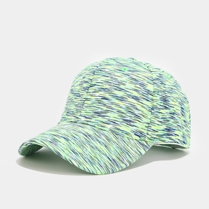 Detail of multi-color tie-dye baseball cap featuring neon green and blue textures