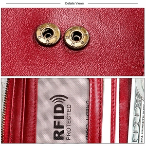 Detail of red pebbled leather wallet showing RFID blocking card slots and gold snap buttons