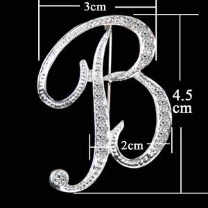 Detail view of silver B-letter brooch with rhinestones showing dimensions 4.5cm by 3cm