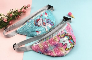 Detail showing two sequin unicorn fanny packs with adjustable straps and zipper closure