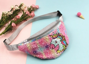 Detail of pink sequin fanny pack with colorful unicorn embroidery and adjustable strap
