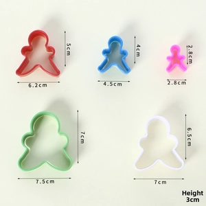 Five assorted plastic gingerbread man cookie cutters in various colors and sizes
