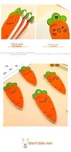 Detail view of the 65-sheet carrot-shaped notepad with secure screw binding