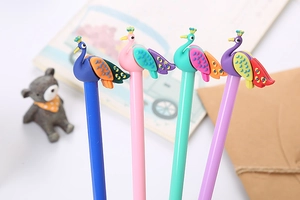 Close-up of four colorful peacock cartoon pens in blue, pink, green, and purple silicone