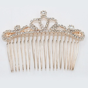 Elegant gold crown hair comb with sparkling rhinestones on a clean white background