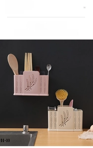 Detail of wall-mounted kitchen utensil holder with breathable wheat pattern drainage holes