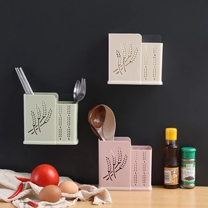 Wall-mounted cutlery holder with drainage holes in three colors for kitchen organization