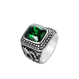 Detailed relief of Chinese dragon on retro stainless steel ring with green gemstone