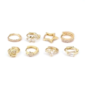 Set of 8 gold hoop earrings with sparkling cubic zirconia in various geometric designs