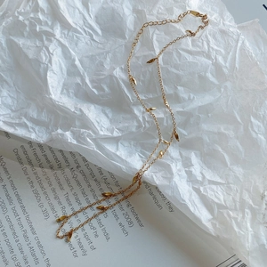 Minimalist 925 sterling silver gold-plated necklace with delicate leaf charm pendants