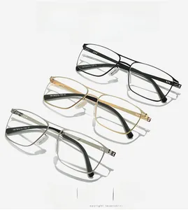 Detailed close-up of retro metal business glasses frames in black, gold, and silver finishes