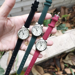Bronze cat-ear fashion quartz watches with faux leather straps in black, green, and red