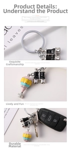 Detail of colorful hot air balloon keychain with mini binoculars and sparkling rhinestones