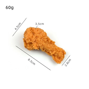 Realistic PVC fried chicken leg model keychain with size dimensions of 8.5cm by 4.5cm