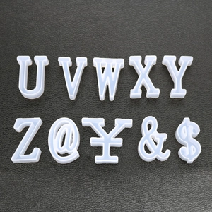 Detail view of translucent silicone alphabet and symbol molds for DIY resin casting