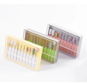 Detailed set of ceramic and alloy nail drill bits with color-coded organizer boxes