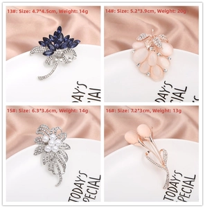 Detail view of crystal flower and cat-eye stone alloy brooches in four elegant styles