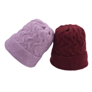 Winter chunky knit beanie hats in light purple and burgundy colors with cable stitch pattern