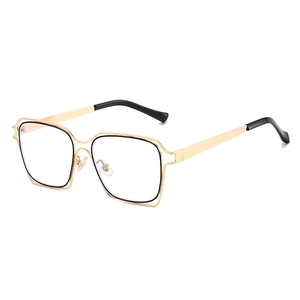 Monture de lunettes œil-de-chat en métal doré champagne avec design carré évidé double