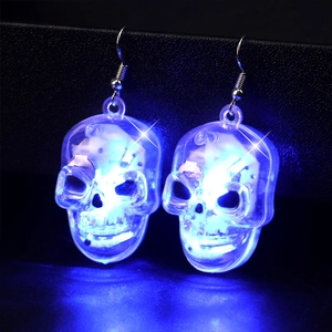 Glow-in-the-dark blue LED skull earrings with metallic hooks for Halloween party style