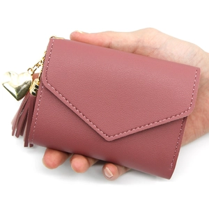 Women's compact tri-fold envelope wallet in pink faux leather with heart tassel