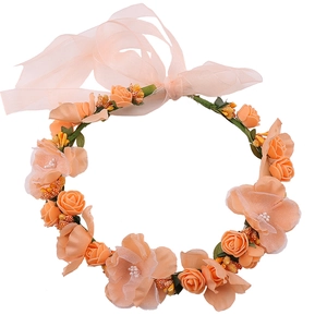 Floral bridal wreath with orange roses, pearls and ribbon for wedding party hairstyles