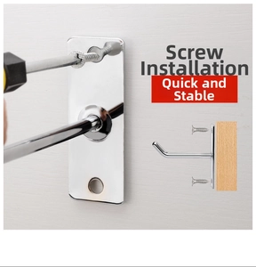 Detail of metal hook installation showing screw fixing process and mounting components