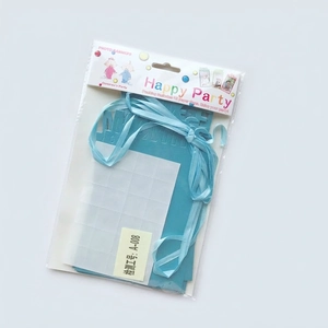 Blue 12-month photo banner set for baby birthday party with ribbons and glue points
