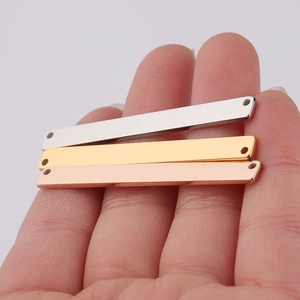 Set of three rectangular stainless steel bar connectors in silver, gold and rose gold colors