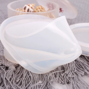 Flexible silicone mold for crafting round jewelry boxes with lids and finished samples