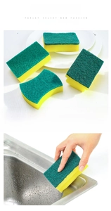 Dual-sided kitchen scrubbing sponge showing green scouring pad and yellow sponge texture