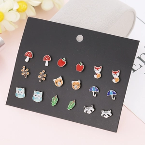 Detailed view of 18 piece enamel stud earrings set featuring animals and nature motifs