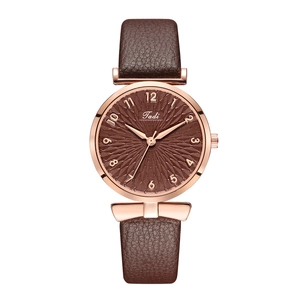 Elegant women's quartz watch with rose gold case, brown leather strap, and textured dial