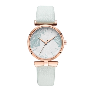 Women's rose gold quartz watch with mint green leather strap and palm leaf pattern dial