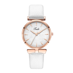Elegant women's quartz watch with white leather strap and rose gold leaf pattern dial