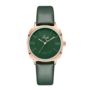 Minimalist ultra-thin women's watch with dark green leather strap and rose gold case