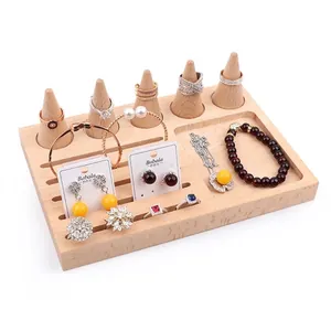 Beech wood jewelry display tray with five cone ring holders and earring card slots